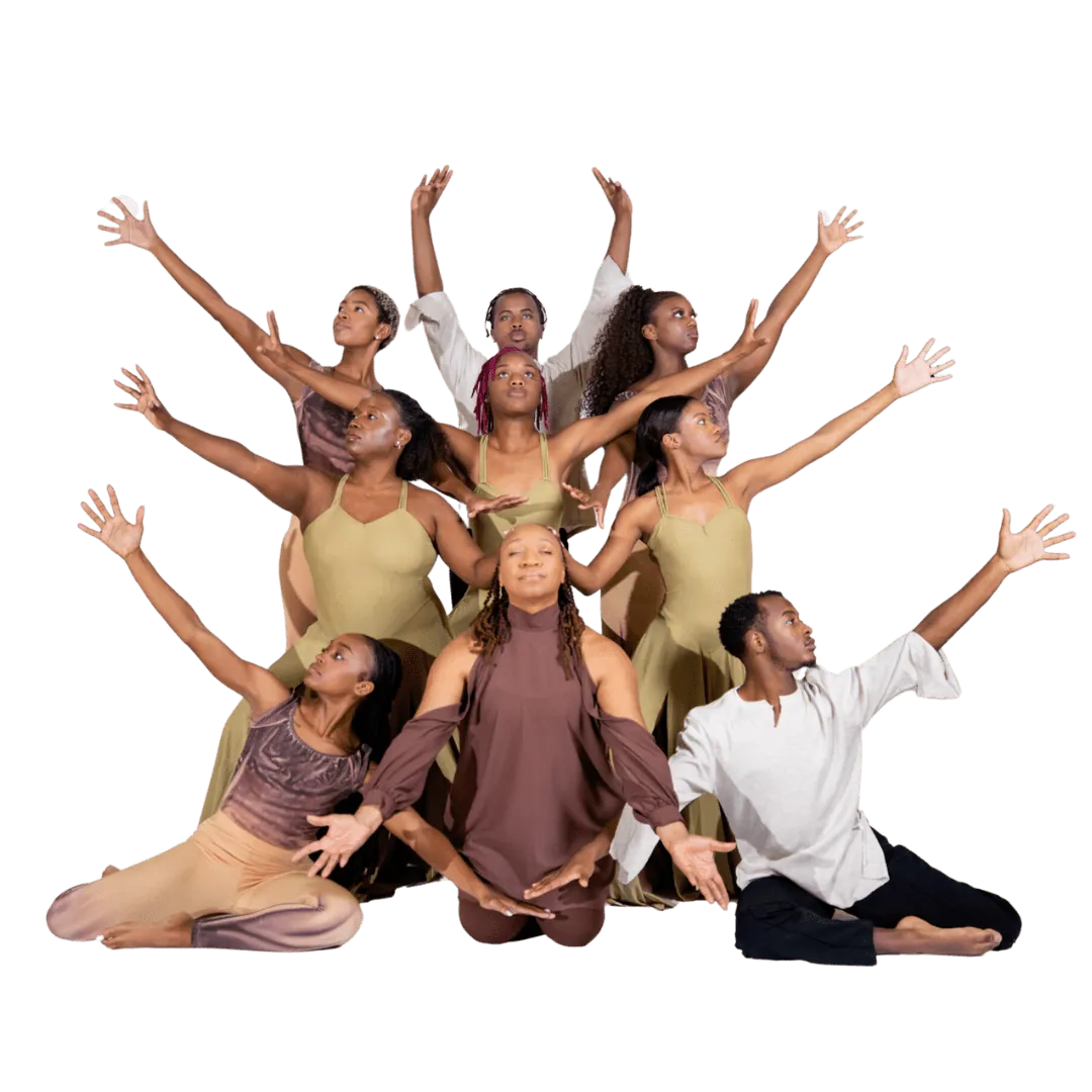 A group of dancers wearing brown, olive and white outfits performing together in a dynamic and energetic display